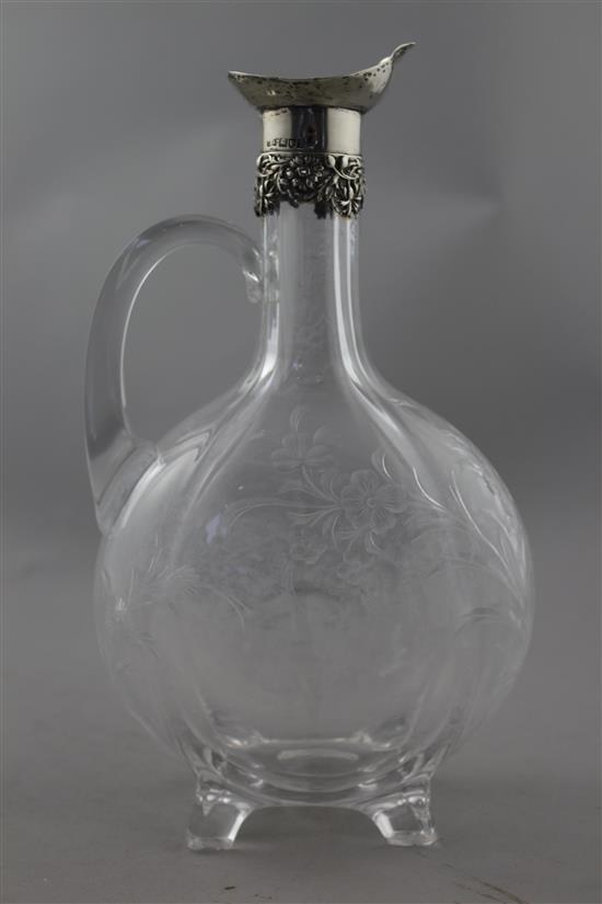 An Edwardian silver mounted rock crystal glass claret jug, c.1904, 24.5cm, crizzling